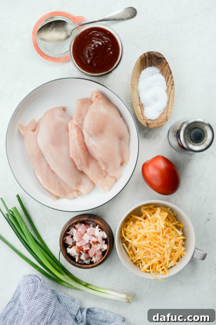 Cheesy Skillet Monterey Chicken 4 Ingredients for Skillet Monterey Chicken laid out on a cutting board