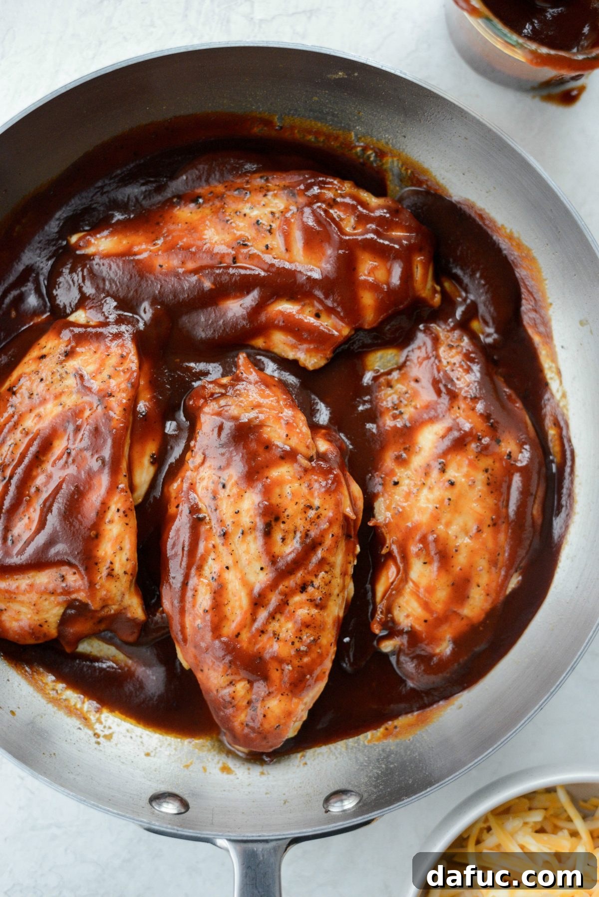 Cheesy Skillet Monterey Chicken 10 Coating chicken breasts in barbecue sauce in the skillet