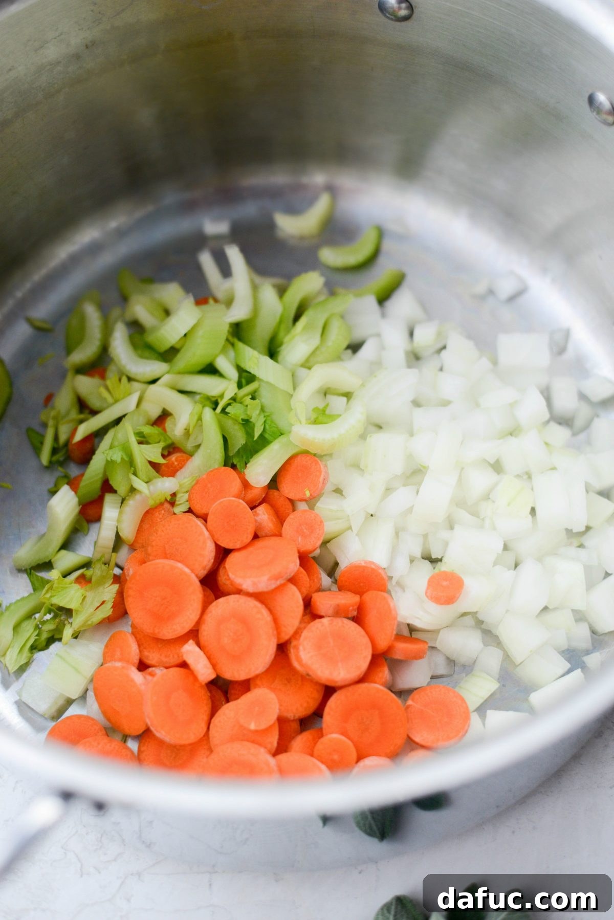 Cozy Turkey Noodle Comfort 5 Adding vegetables to pot for Turkey Noodle Soup