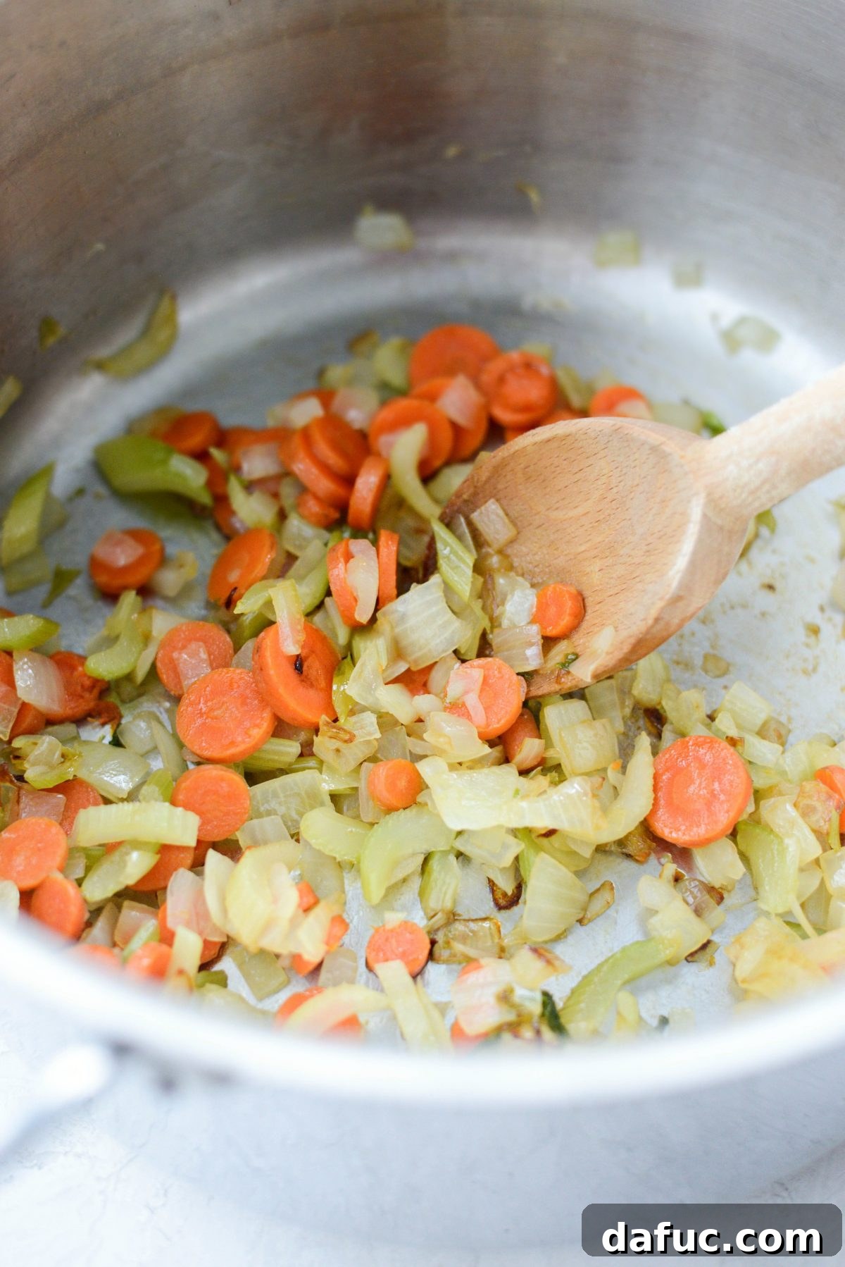 Cozy Turkey Noodle Comfort 6 Sautéed vegetables in pot for Turkey Noodle Soup