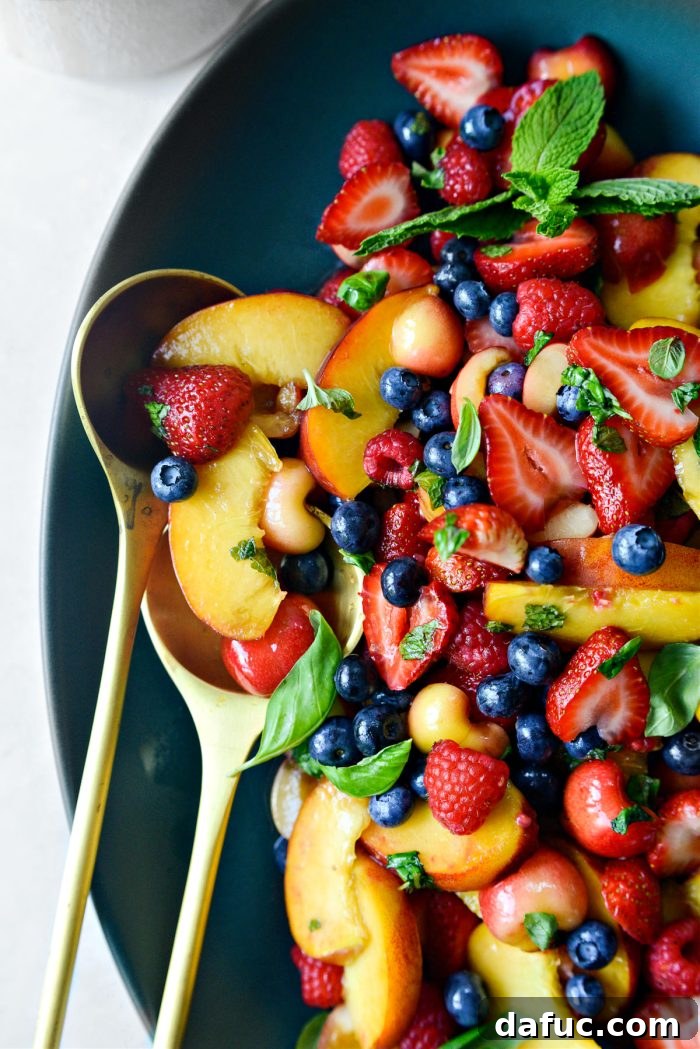 A closer look at the garnished Summer Fruit Salad, ready to be enjoyed