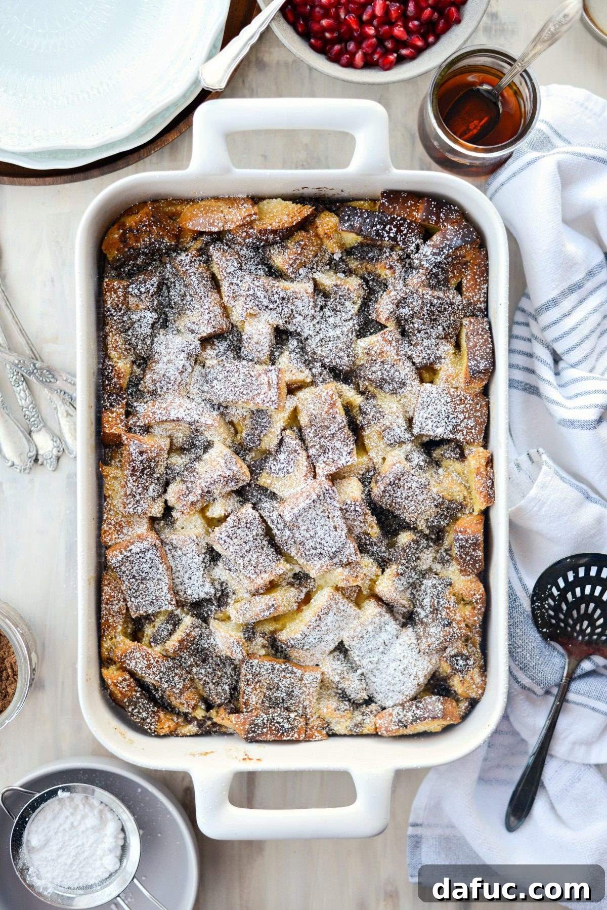 Gingerbread French Toast Bake dusted with powdered sugar