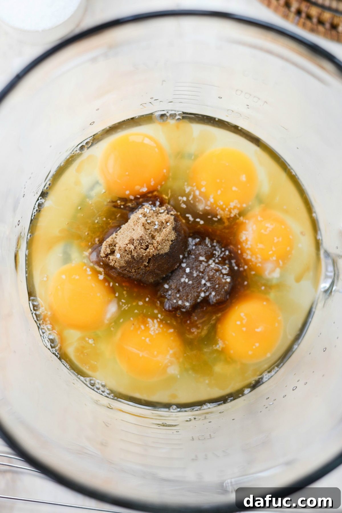 Wet ingredients for custard in a mixing bowl