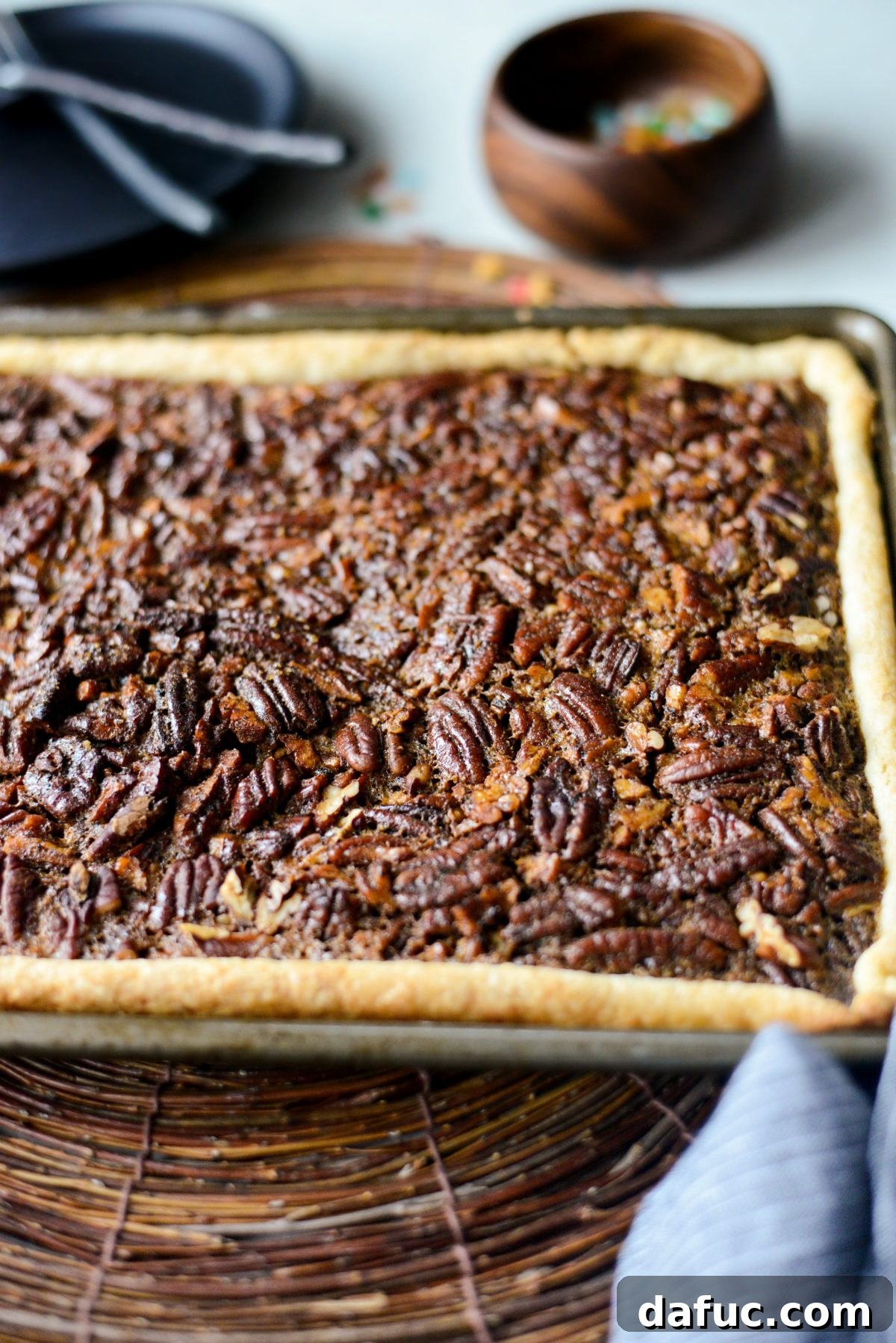Just baked Gingerbread Pecan Slab Pie cooling on a wire rack