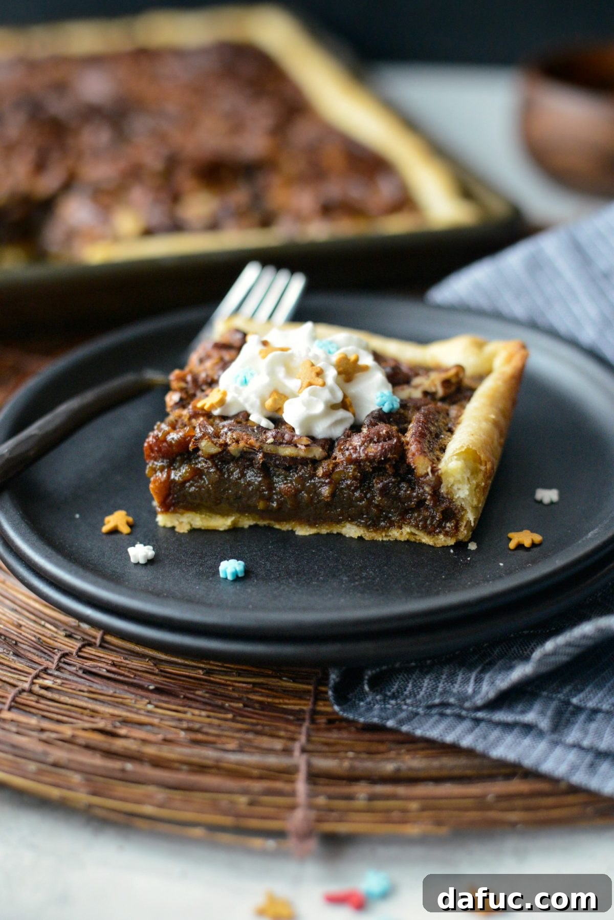 Close-up of a full Gingerbread Pecan Slab Pie, showcasing its rich texture