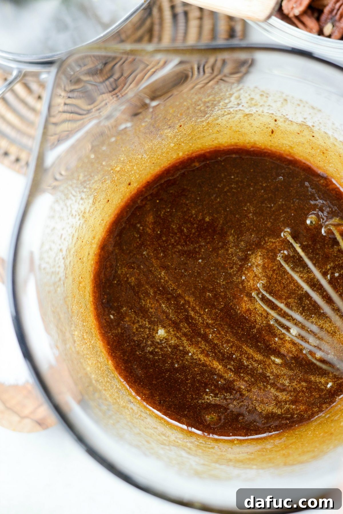 Final whisking of the pie filling to incorporate butter