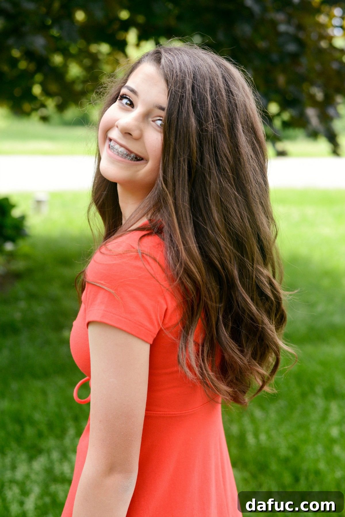 2018 Unpacked 11 Malloree's bright smile after getting braces, showcasing newfound confidence.
