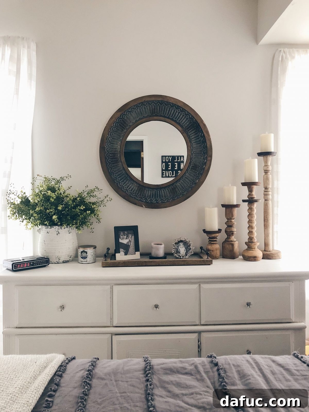 2018 Unpacked 18 A cozy master bedroom, showcasing the custom-built headboard and updated decor.