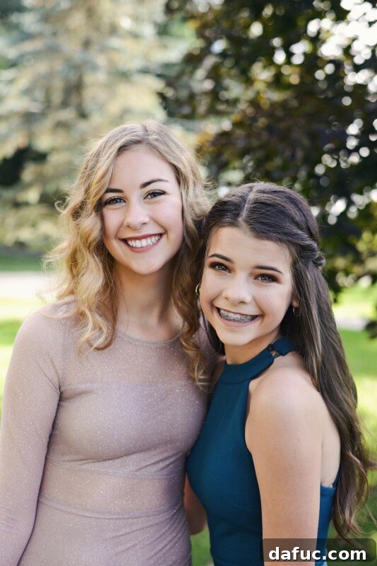 2018 Unpacked 23 Malloree, radiating joy, strikes a pose at her high school homecoming dance.