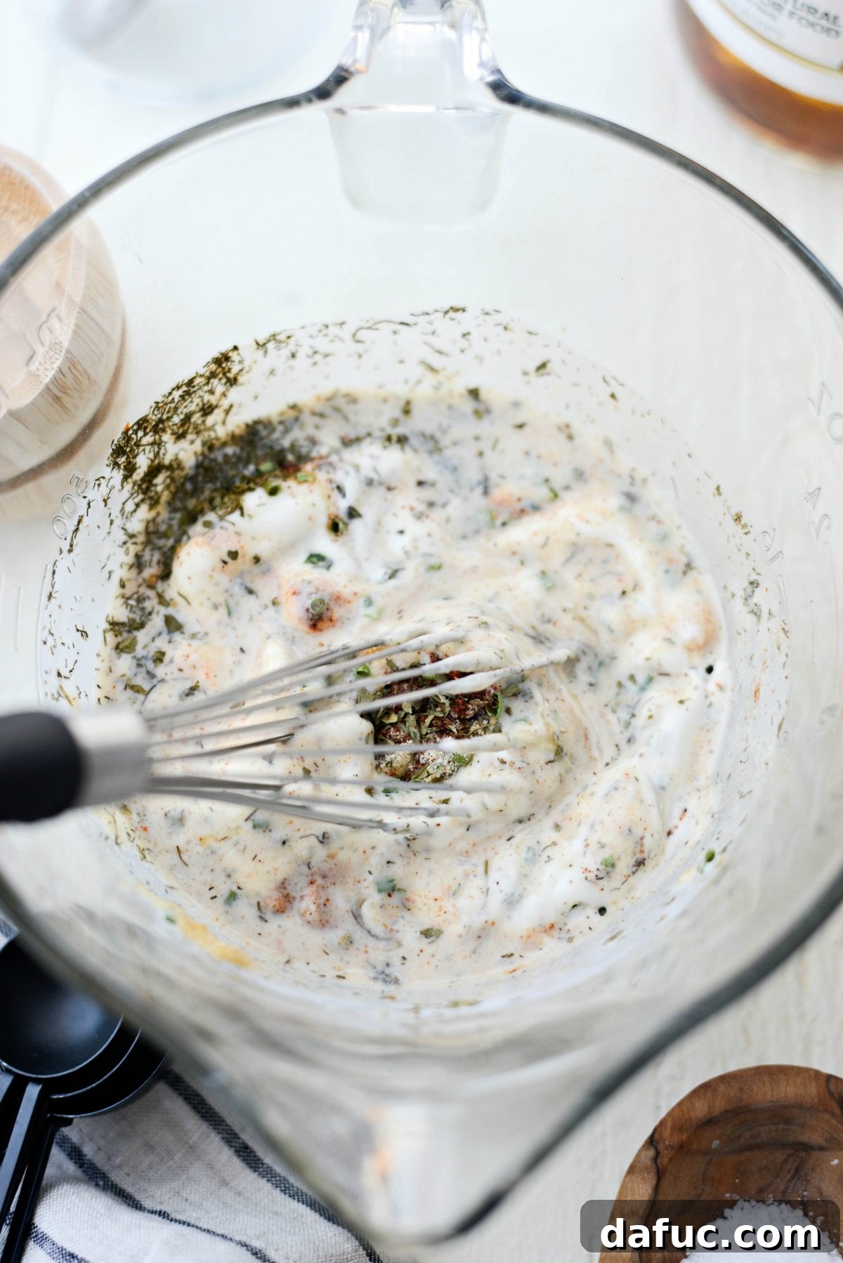 Whisking the Ingredients for Greek Yogurt Ranch Dressing