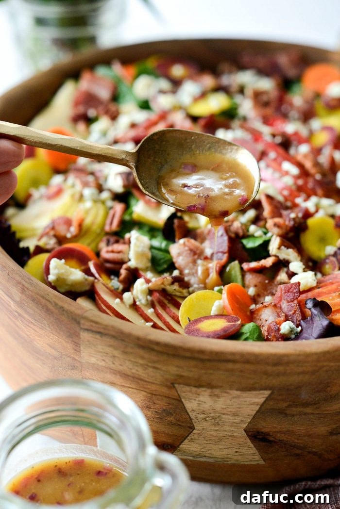 Golden Autumn Salad with Sweet and Savory Maple Bacon Vinaigrette 14 drizzling salad with dressing