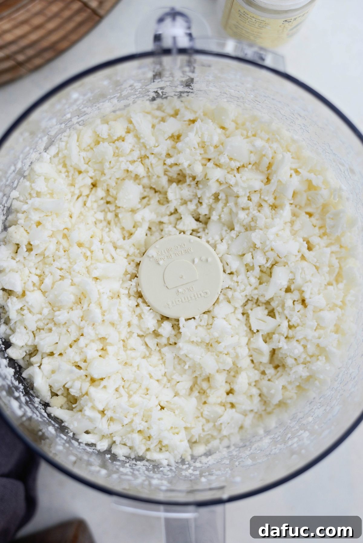 Crisp Roasted Cauliflower Grains 5 Riced cauliflower in a bowl, ready for roasting