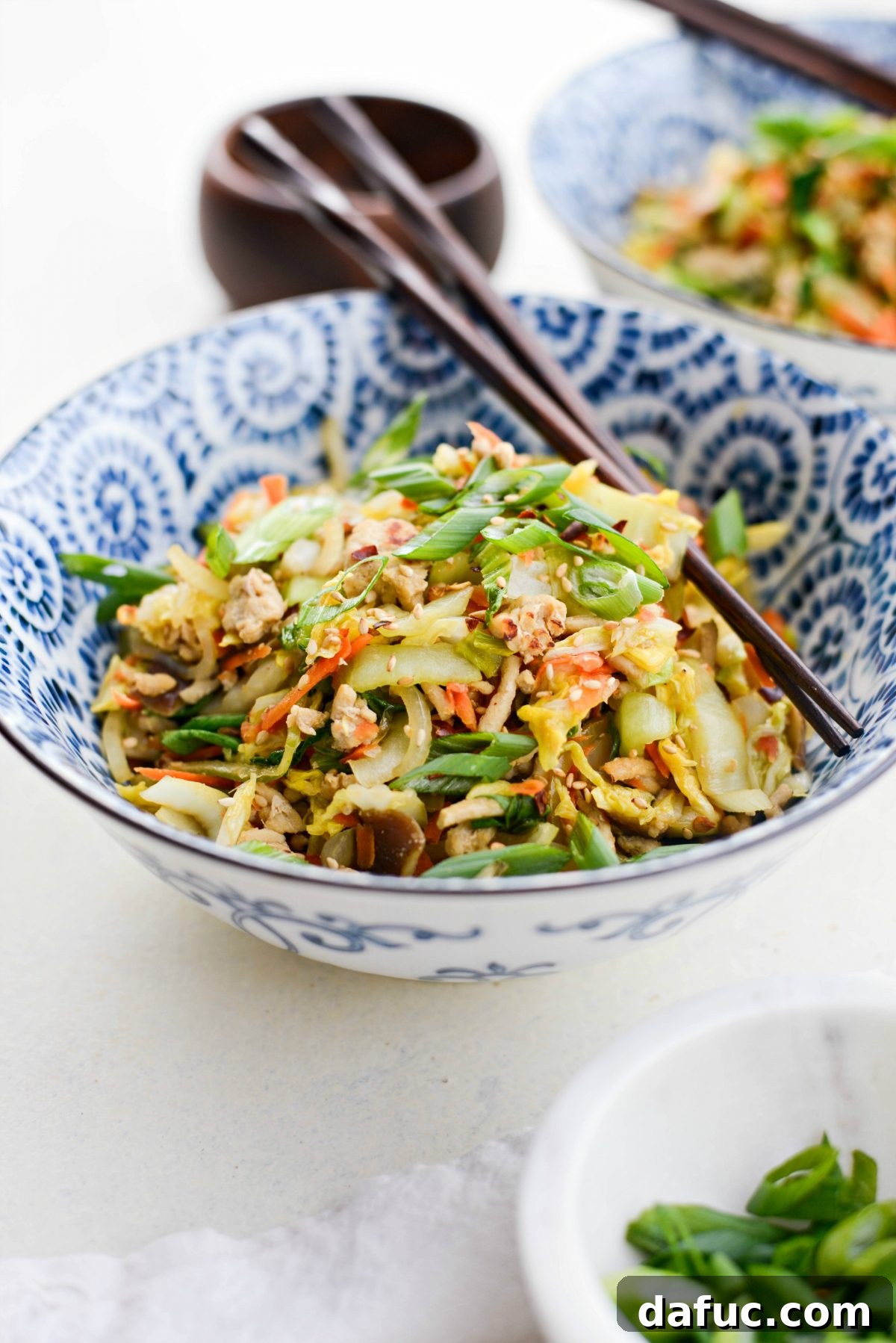 No-Wrap Chicken Egg Roll Bowl 16 Chicken Egg Roll Bowl with chopsticks