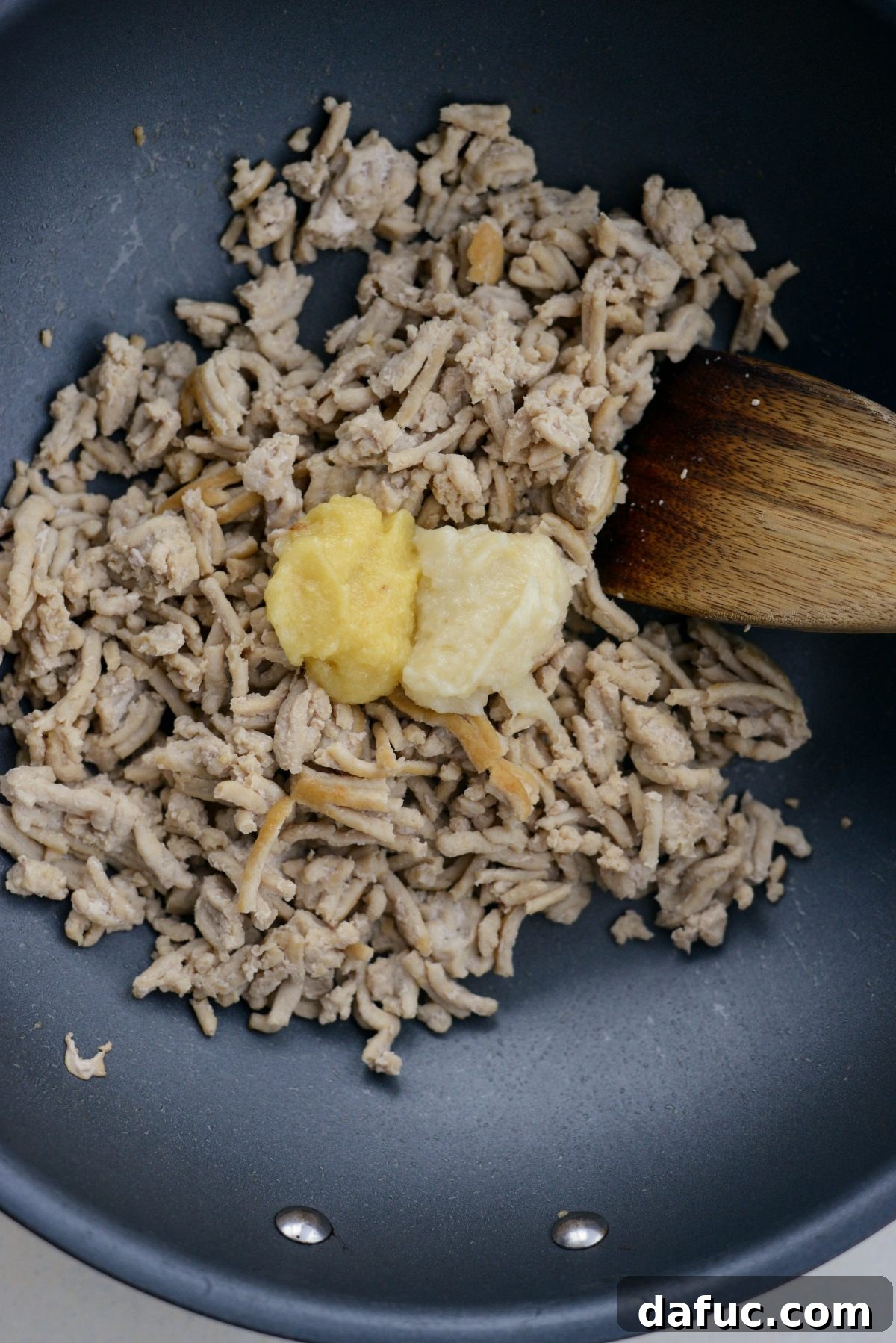 No-Wrap Chicken Egg Roll Bowl 9 Adding in ginger and garlic