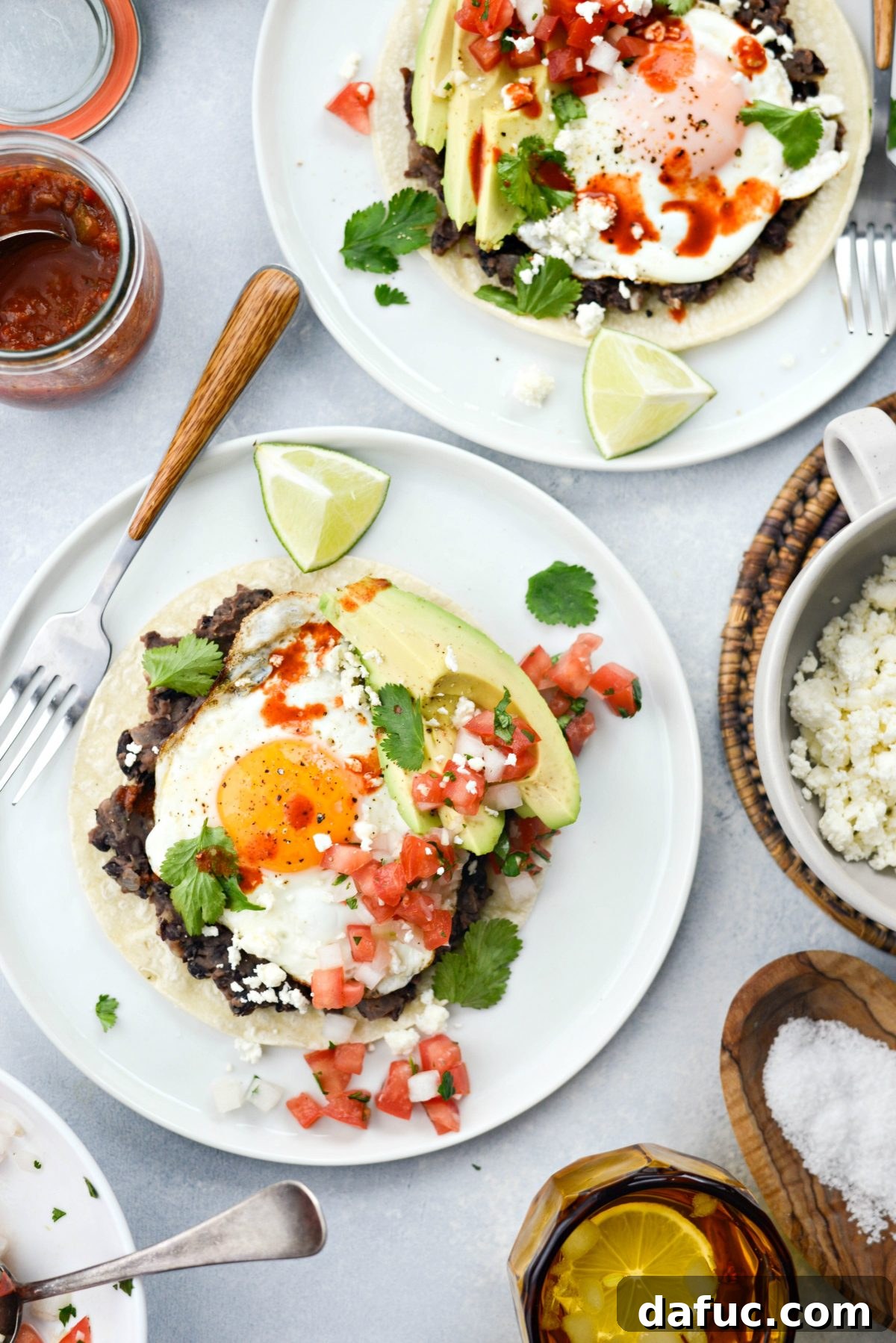 Huevos Rancheros artfully arranged on a plate with vibrant colors