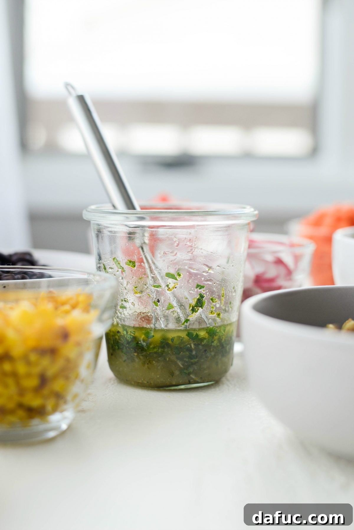 Executive Chop Salad 8 Whisked cilantro lime vinaigrette in a glass jar