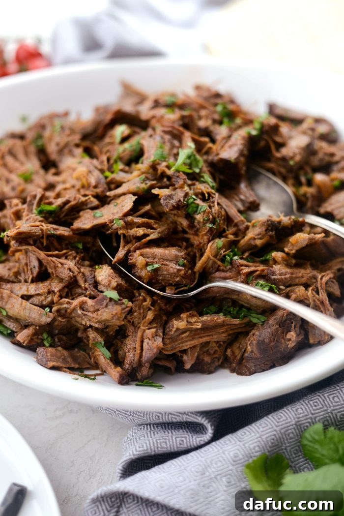 Fall-Apart Tender Slow Cooker Beef Barbacoa 20 A final, artfully styled image of Slow Cooker Beef Barbacoa, emphasizing its deliciousness and appeal.