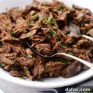 Fall-Apart Tender Slow Cooker Beef Barbacoa 21 Slow Cooker Beef Barbacoa l SimplyScratch.com #beef #barbacoa #texmex #slowcooker #recipe #easy #shreddedbeef