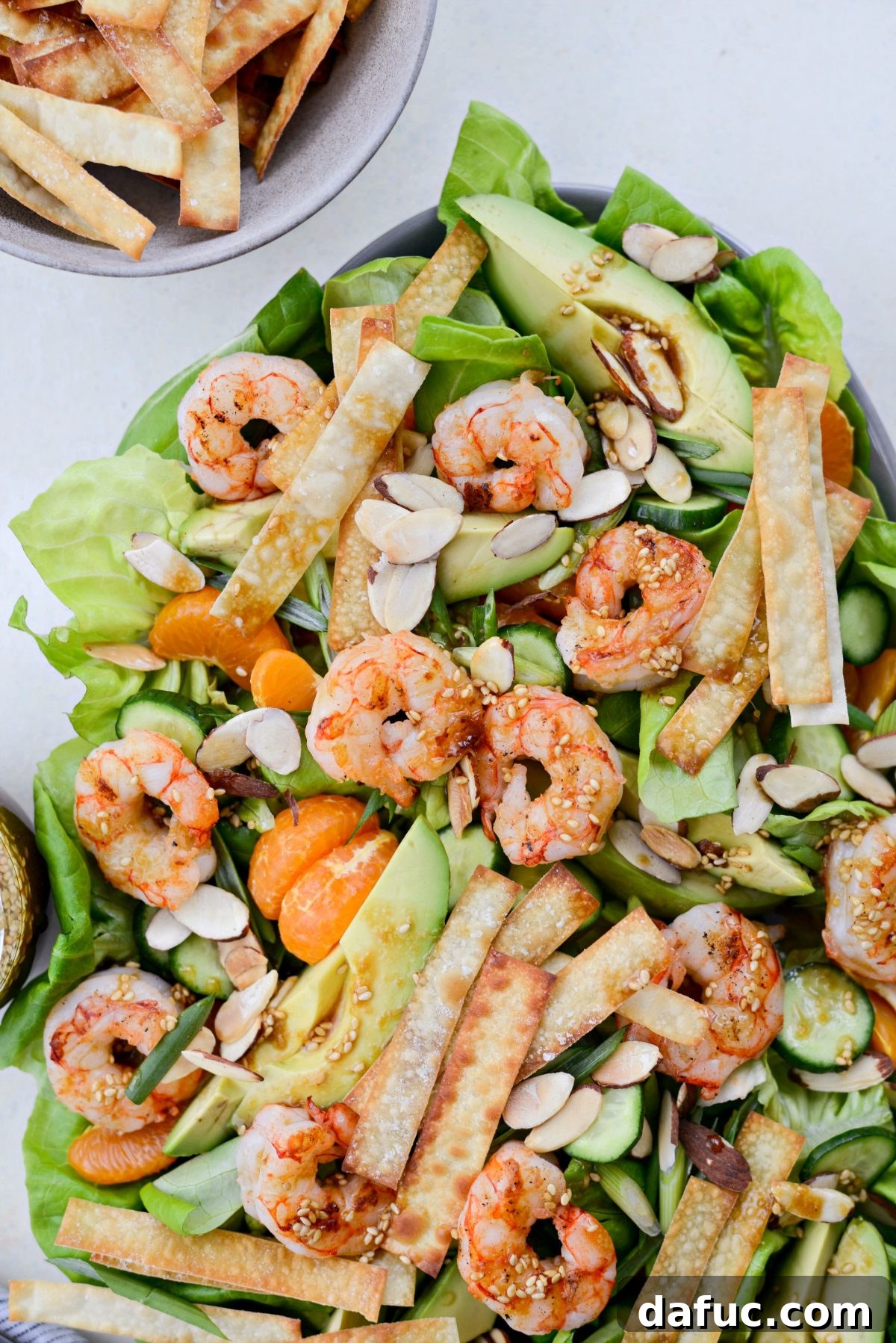 Flame-Kissed Shrimp Salad with Asian Zing and Wonton Crunch 13 Grilled Asian Shrimp Salad with Crispy Wonton Strips
