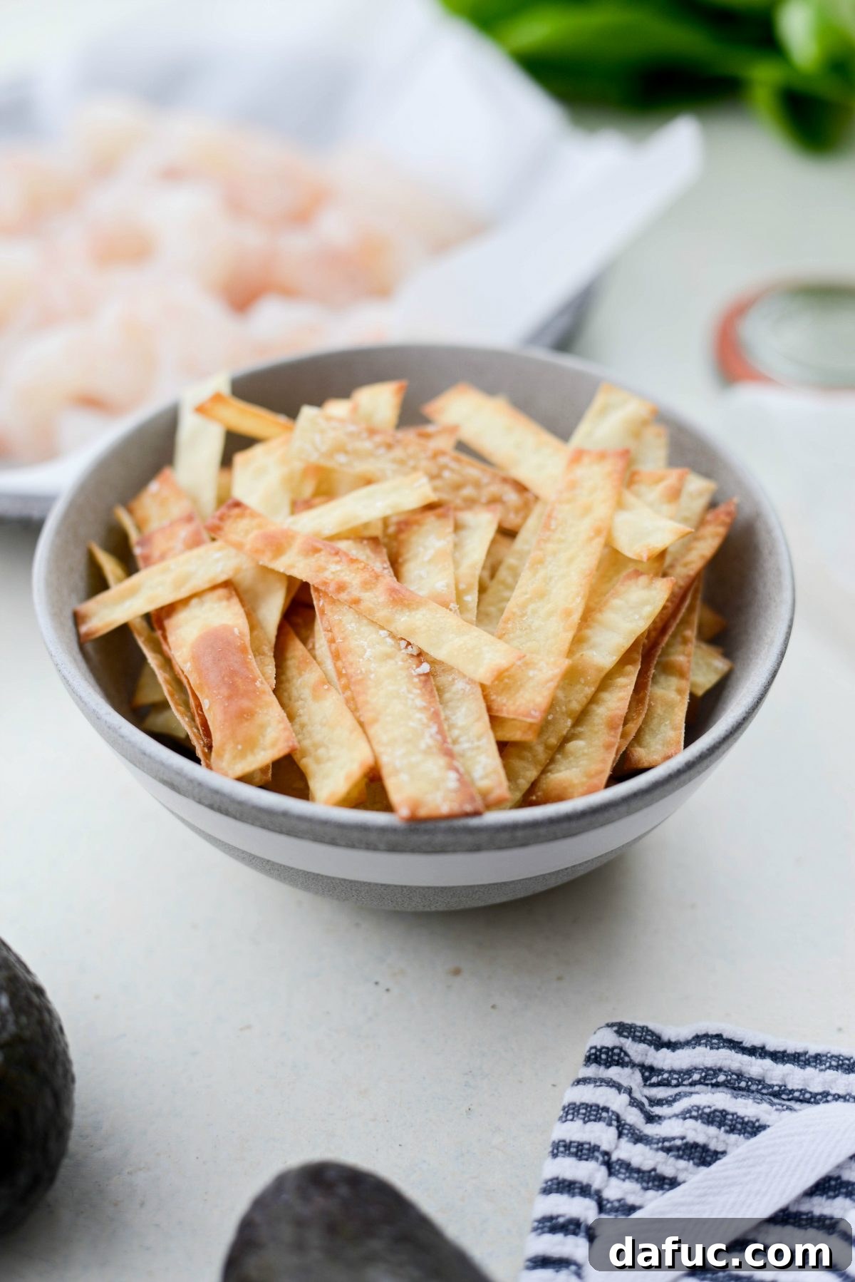 Flame-Kissed Shrimp Salad with Asian Zing and Wonton Crunch 8 bowl of crispy wonton strips