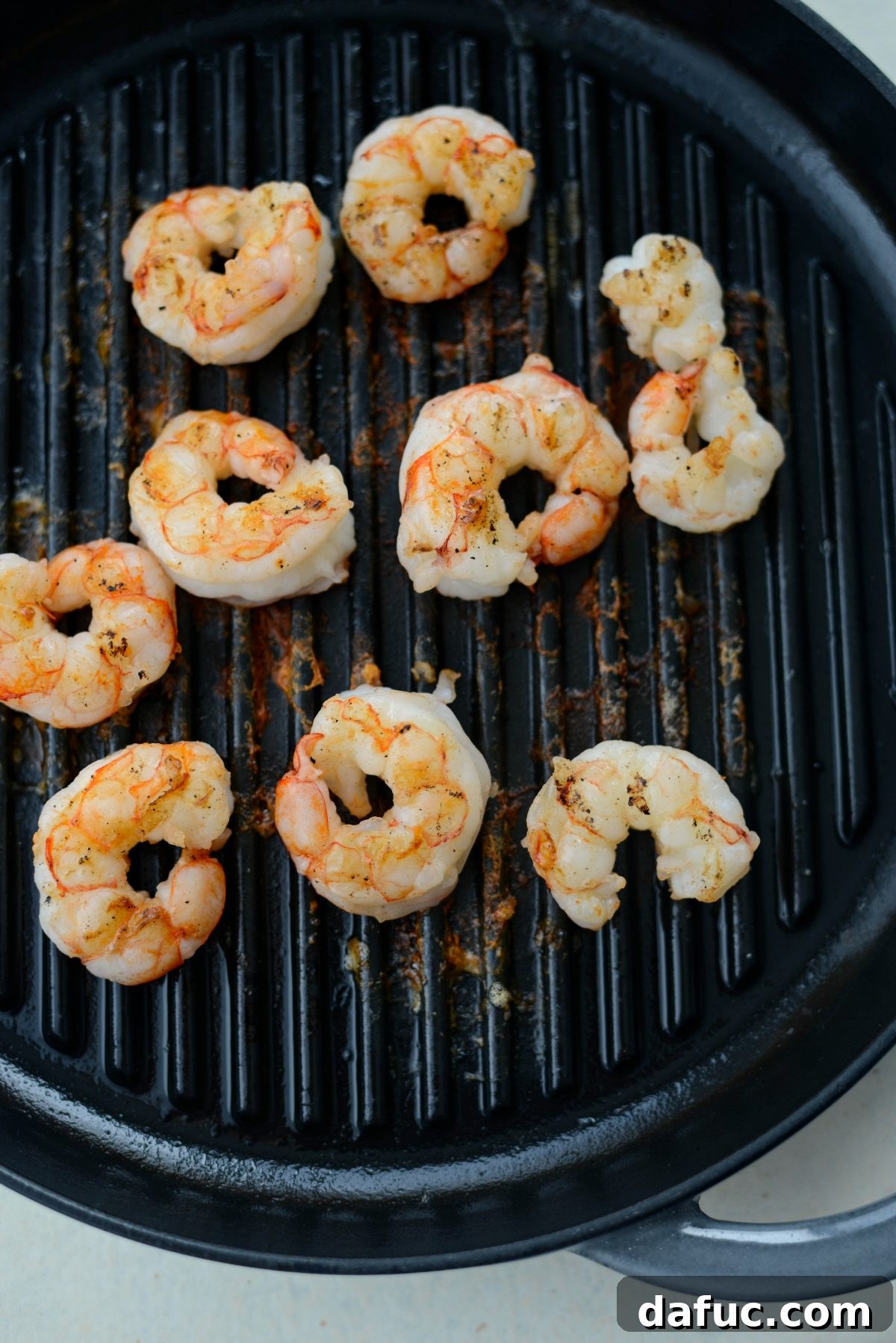 Flame-Kissed Shrimp Salad with Asian Zing and Wonton Crunch 10 Grilling shrimp