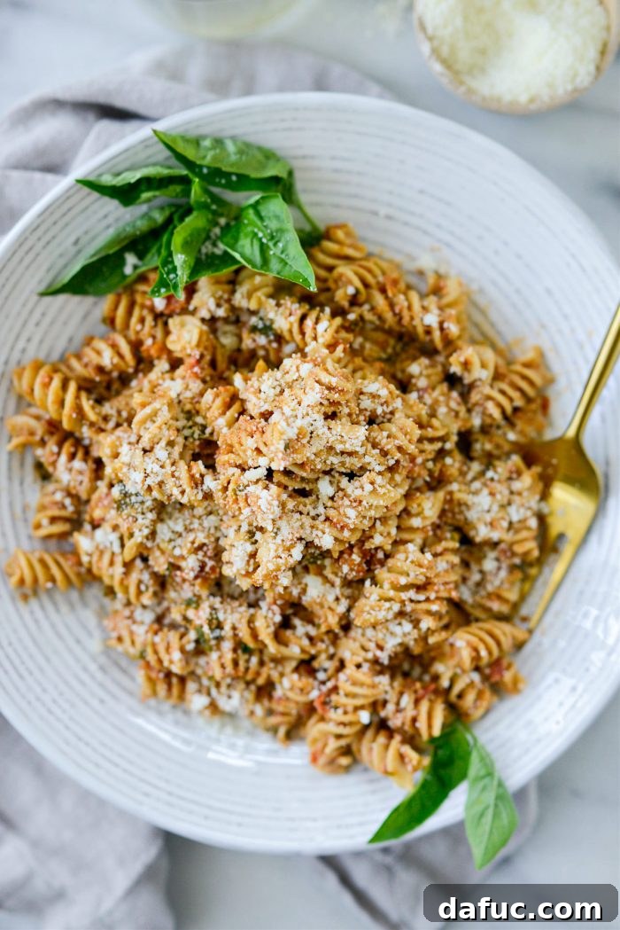 Golden Walnut & Sun-dried Tomato Pesto Pasta 2 Delicious Sun-dried Tomato Toasted Walnut Pesto Pasta served in a bowl