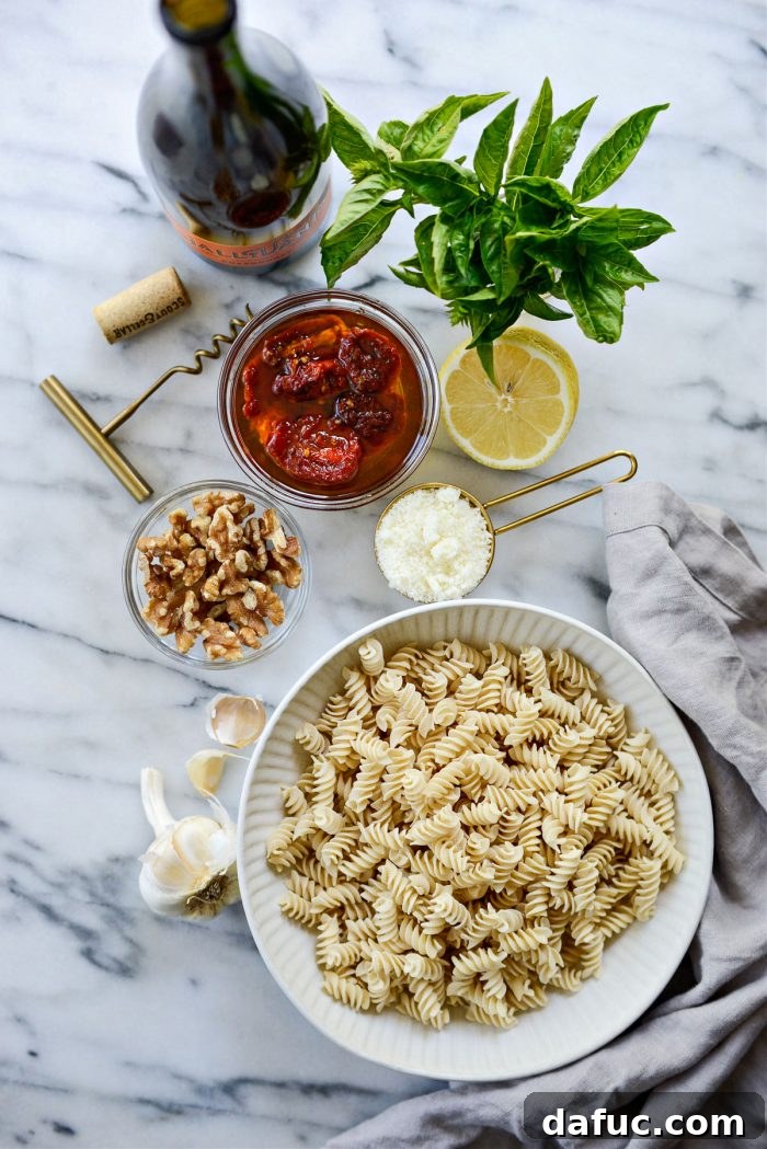 Golden Walnut & Sun-dried Tomato Pesto Pasta 4 Close-up of all the fresh ingredients laid out for making Sun-dried Tomato Walnut Pesto Pasta