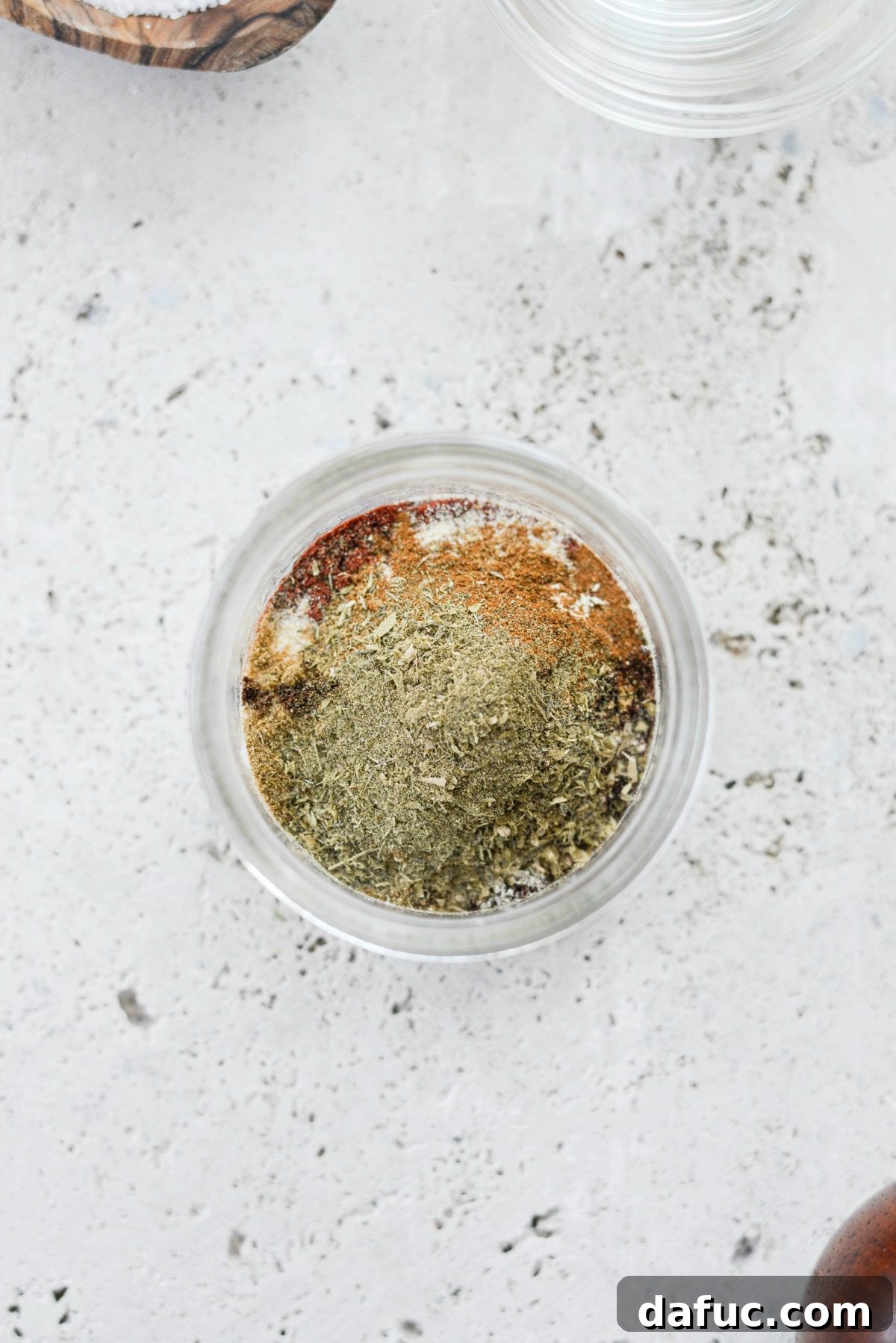 Smoky Chorizo Seasoning 7 Measuring spices into a jar