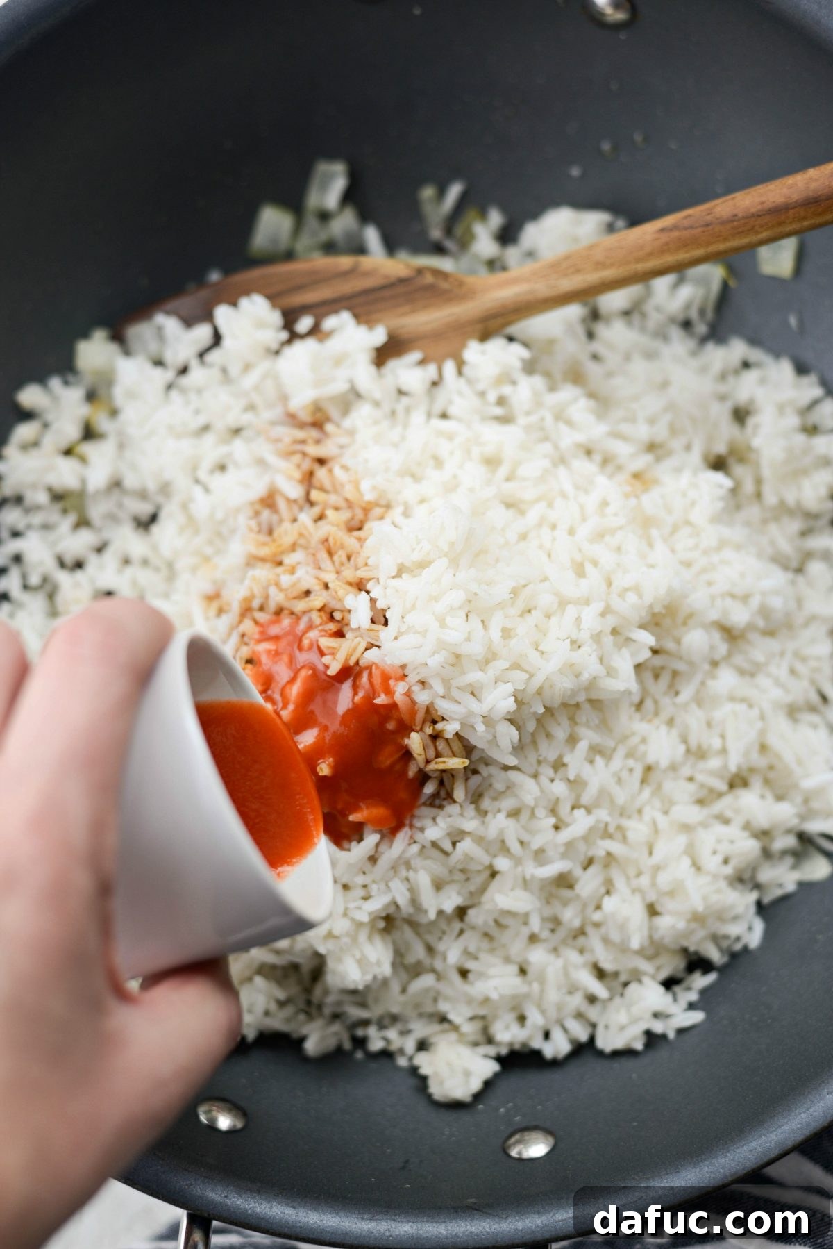 add Frank's Red Hot hot sauce to the fried rice