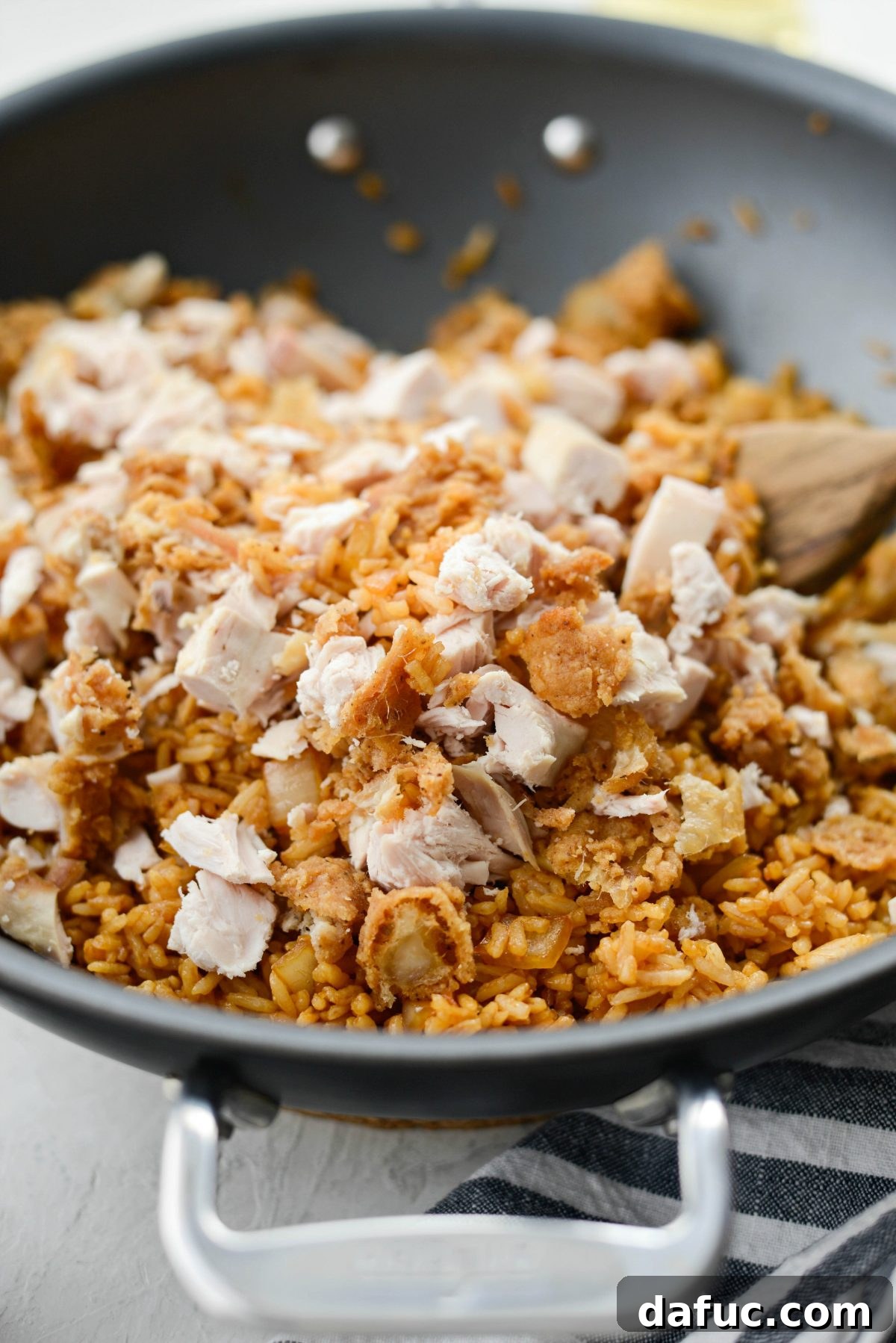 add the Crispy Fried Chicken to the fried rice