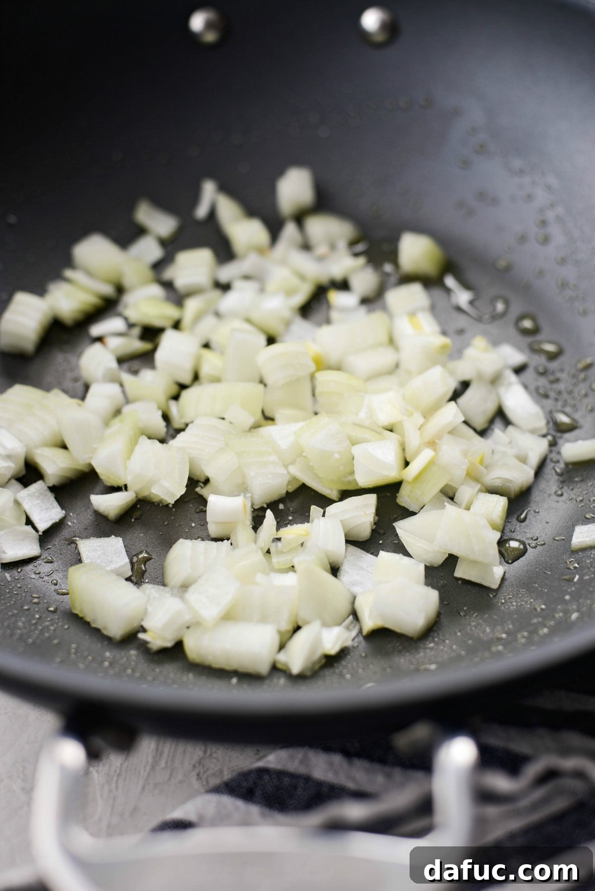add onions to wok with olive oil