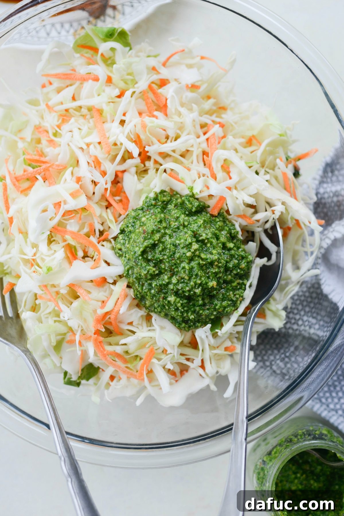 Ingredients for cilantro pesto slaw: shredded cabbage and cilantro pesto