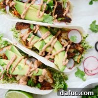 Blackened Fish Tacos with Cilantro Pesto Slaw - The best fish taco recipe!