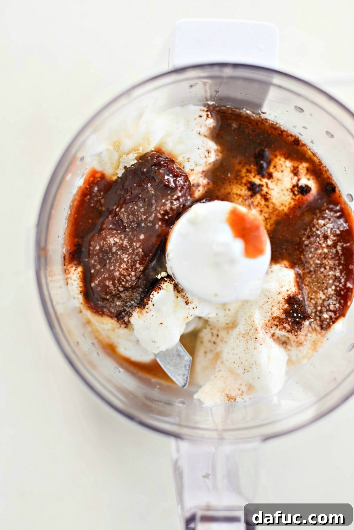Chipotle crema sauce drizzled in a bowl