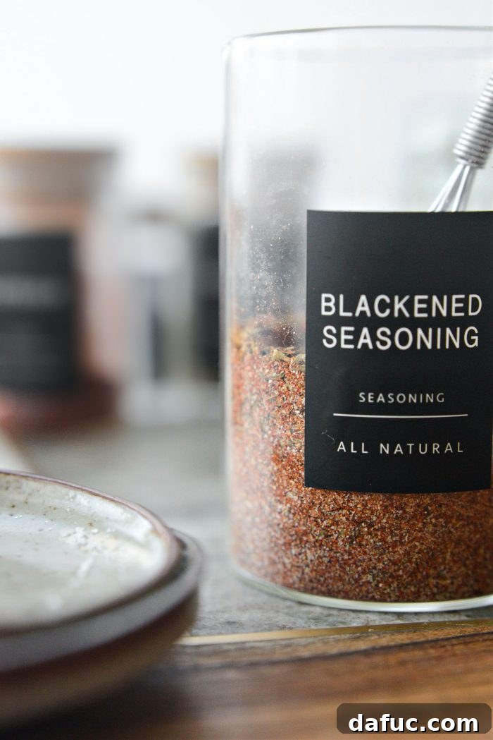 Craft Your Own Blackened Rub 8 Close up of a spoonful of Homemade Blackened Seasoning, highlighting its rich color and texture.