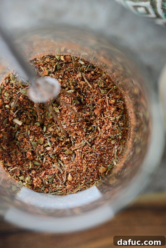 Craft Your Own Blackened Rub 9 Very close up detailed shot of the Homemade Blackened Seasoning in a small bowl, showcasing its texture.