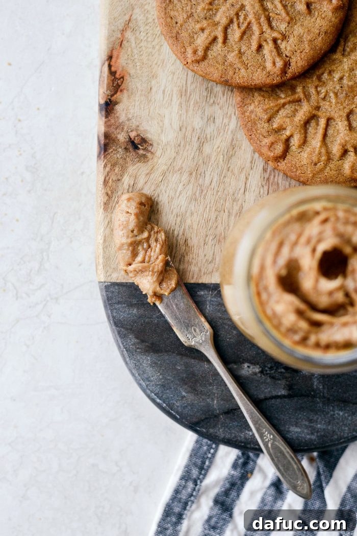 Craft Your Own Speculoos Cookie Butter 3 A glass jar filled with freshly made Speculoos Cookie Butter, a perfect homemade gift or pantry staple.