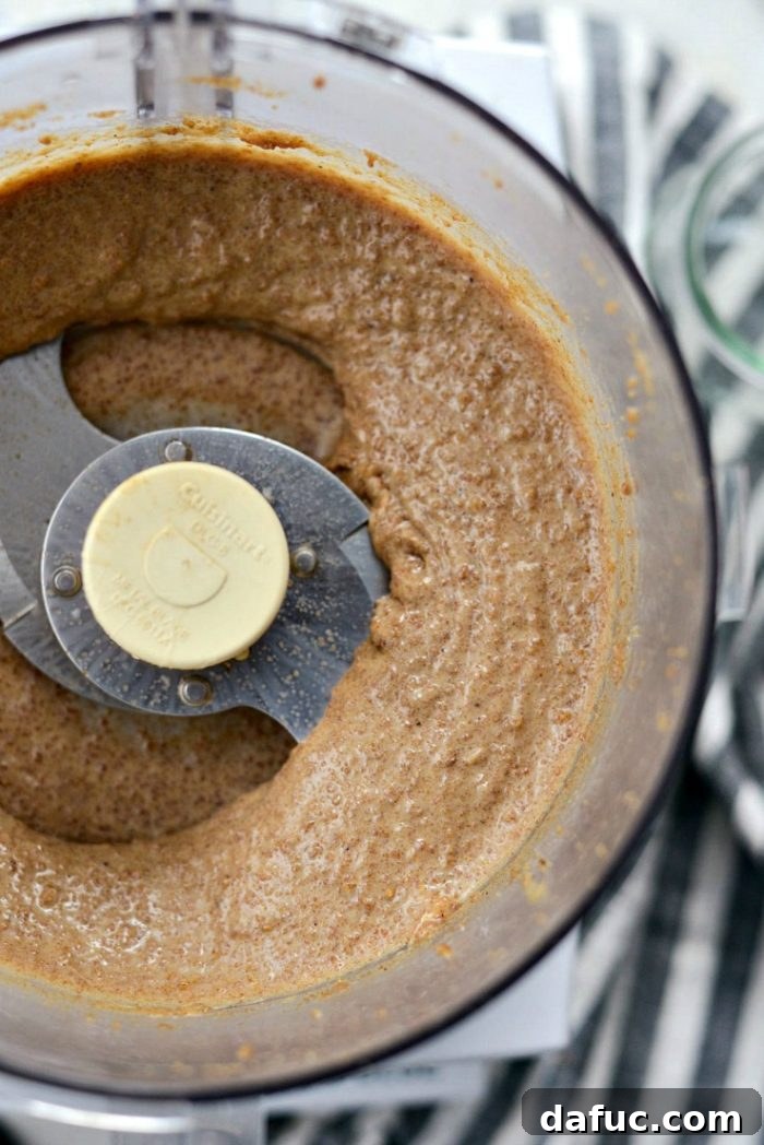 Craft Your Own Speculoos Cookie Butter 8 All liquid ingredients (butter, condensed milk, evaporated milk, vanilla) added to the Speculoos crumbs in the food processor.