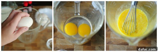 Timeless Red Velvet Cake 5 Two large eggs cracked into a measuring cup, ready to be beaten for the Red Velvet Cake batter.