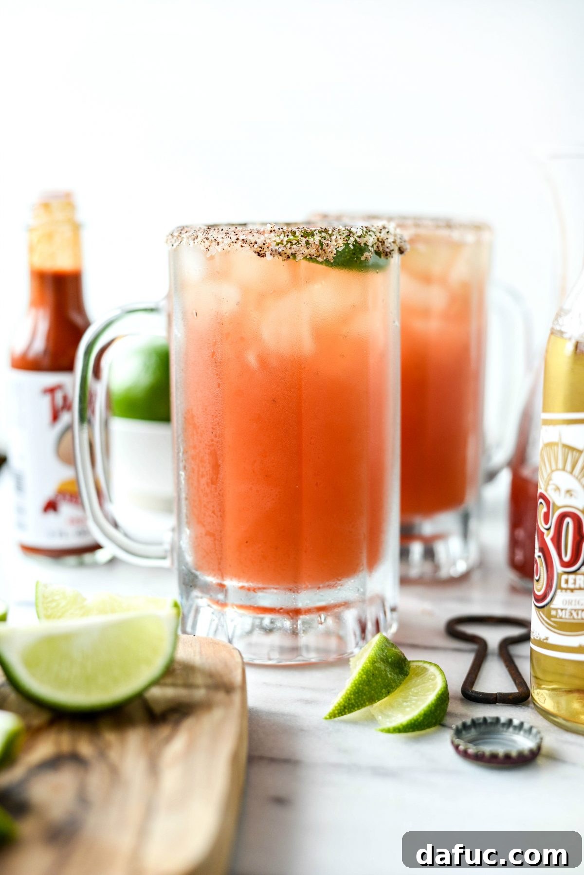 Refreshing Mexican Michelada with a chili-salt rim, perfect for Cinco de Mayo celebrations