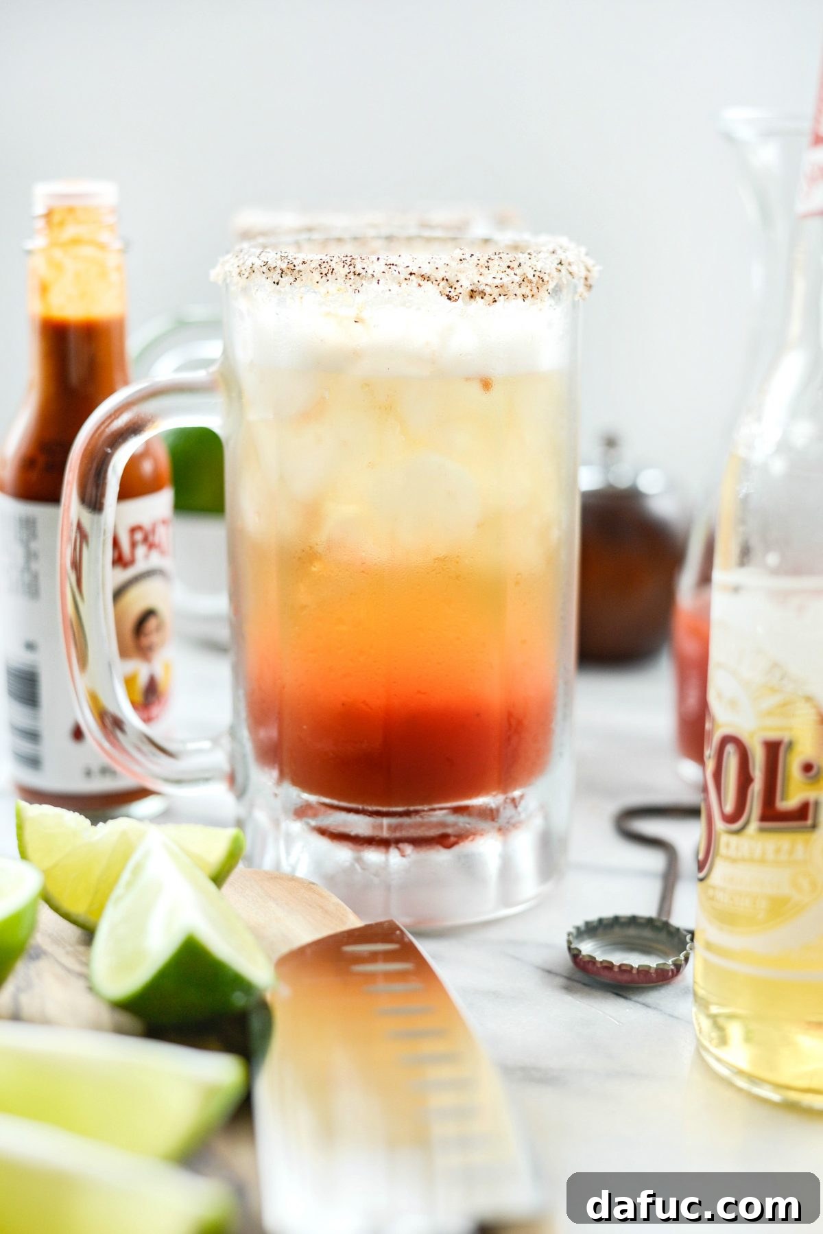The Ultimate Mexican Michelada Recipe 17 Two finished Mexican Micheladas, garnished and ready to be enjoyed