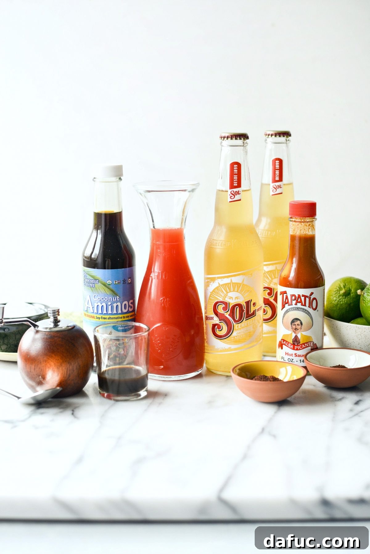 The Ultimate Mexican Michelada Recipe 4 Freshly poured Michelada with condensation on the glass and a vibrant chili-salt rim