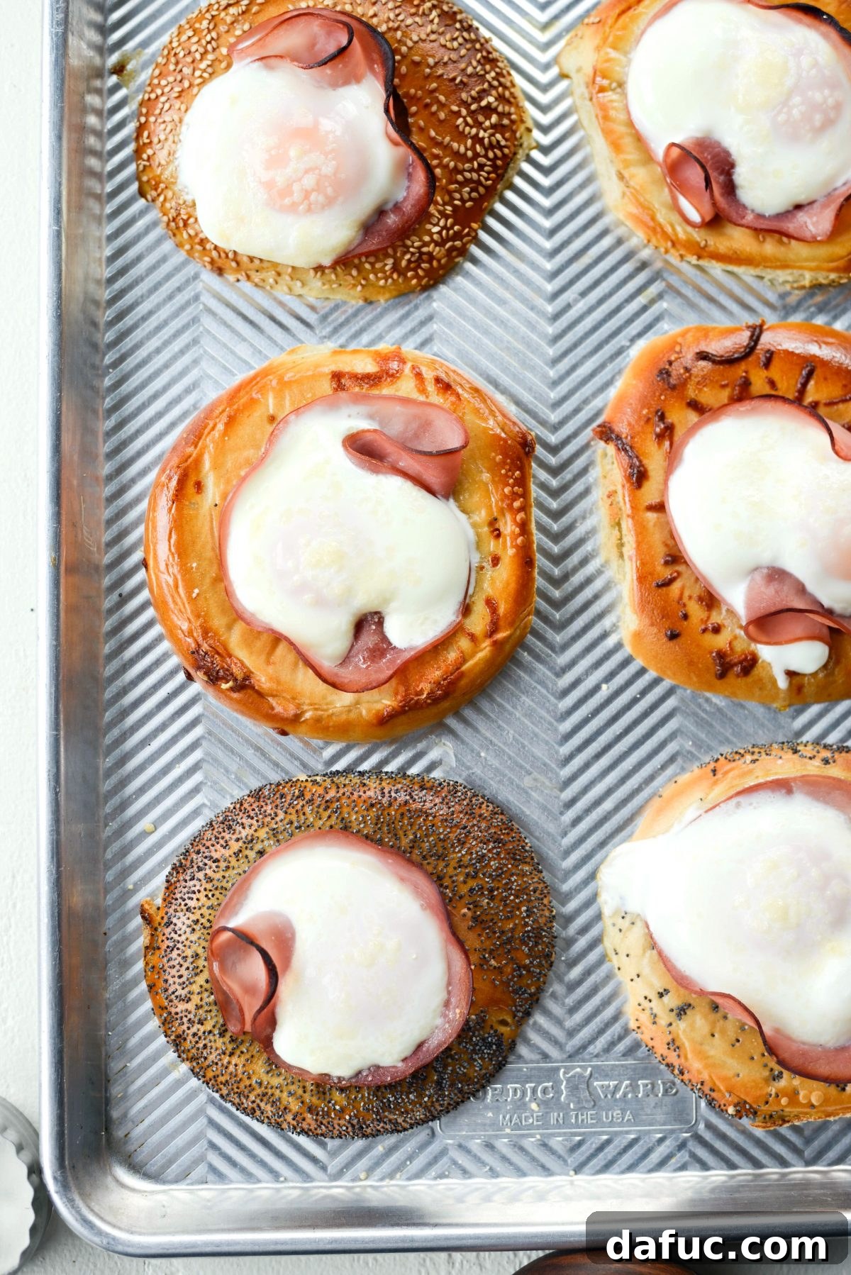 Bagel Egg Nests 13 Baked egg in a hole bagels showing set egg whites and a golden crust