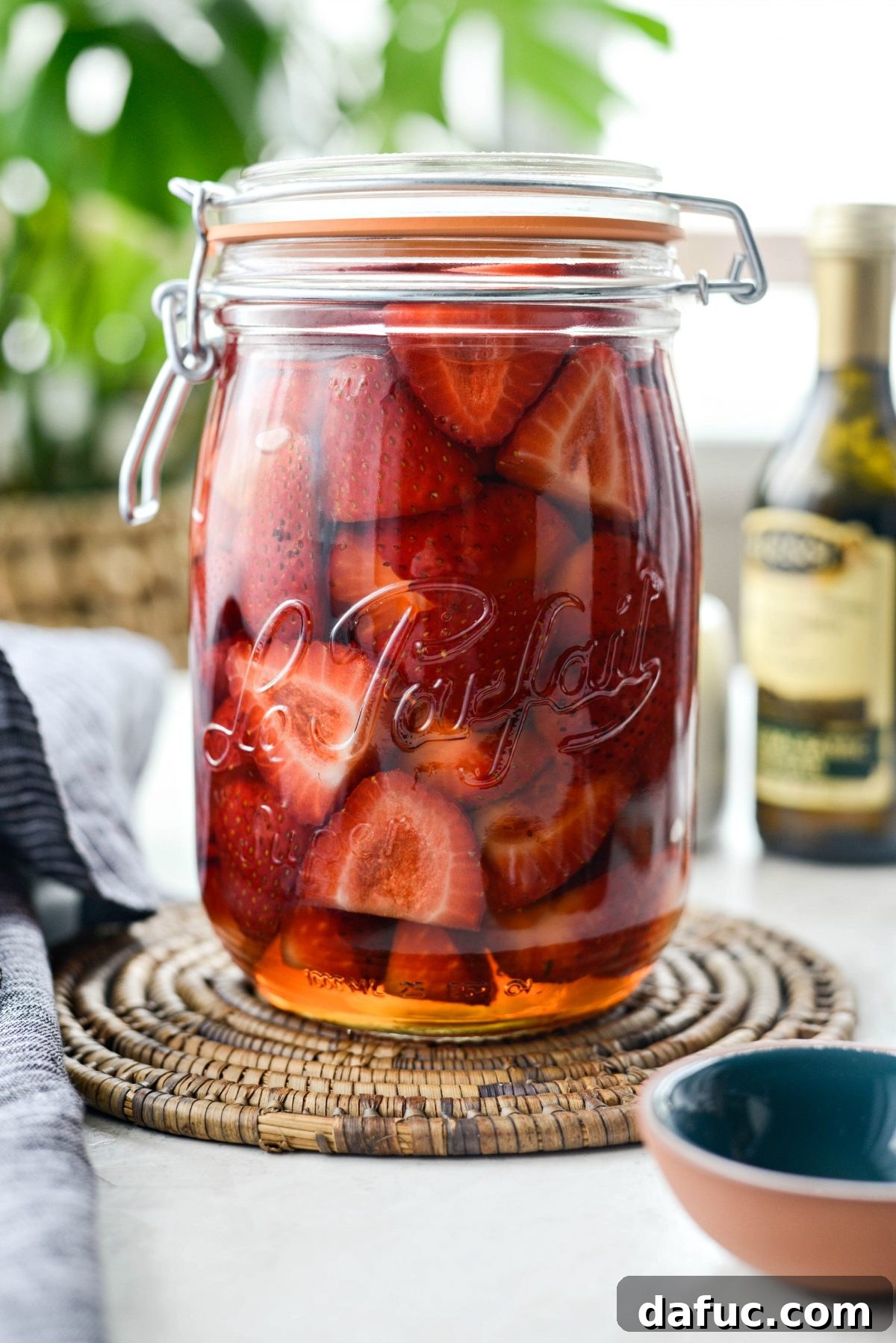 Vinegar-Kissed Strawberries 11 Finished pickled strawberries in a jar, ready to be enjoyed.