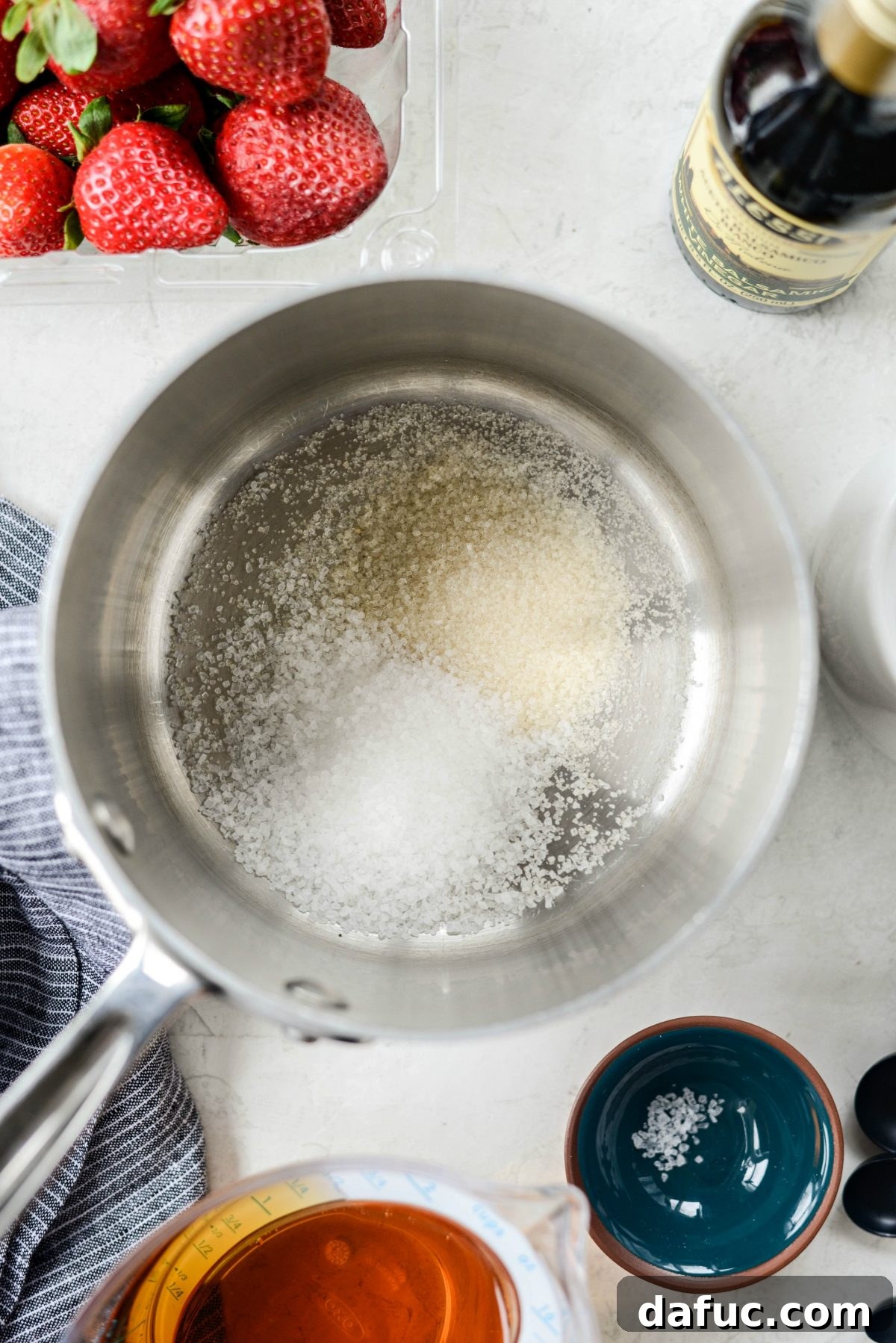 Vinegar-Kissed Strawberries 4 Sugar and sea salt dissolving in a saucepan with pickling liquid.