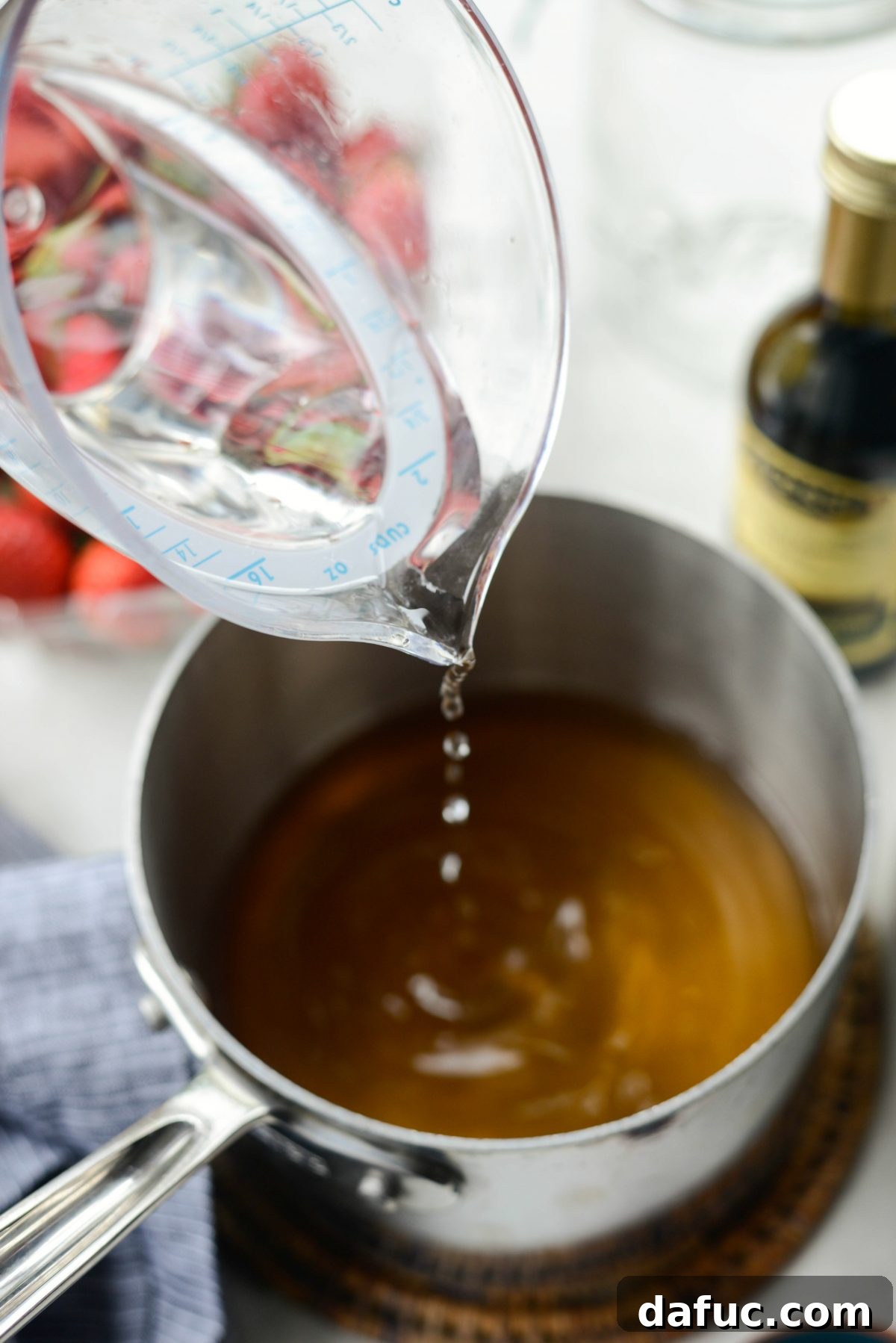 Vinegar-Kissed Strawberries 6 Stirring the pickling liquid in a saucepan until sugar and salt are fully dissolved.