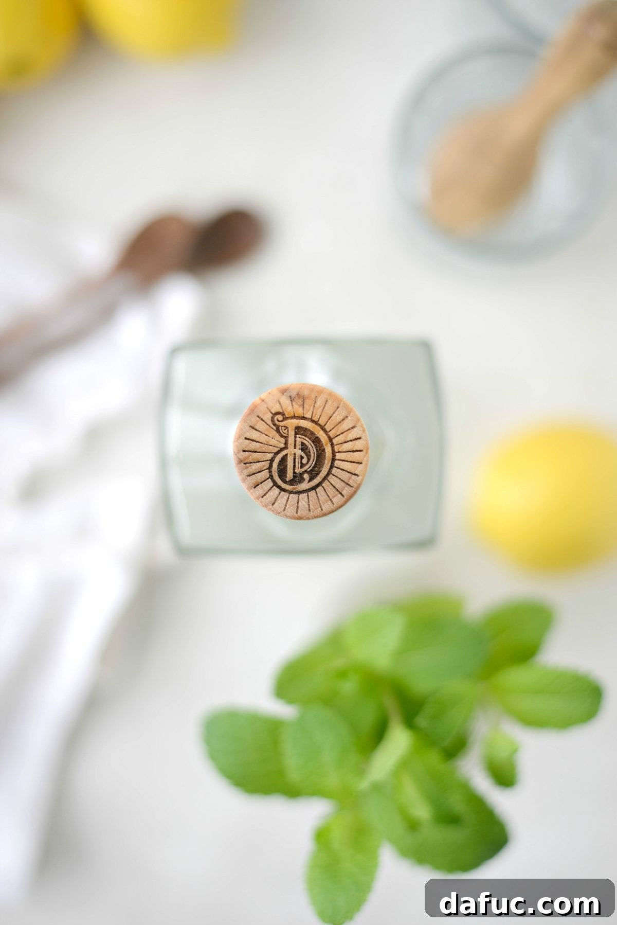 Top down view of a stylish gin bottle, emphasizing its branding