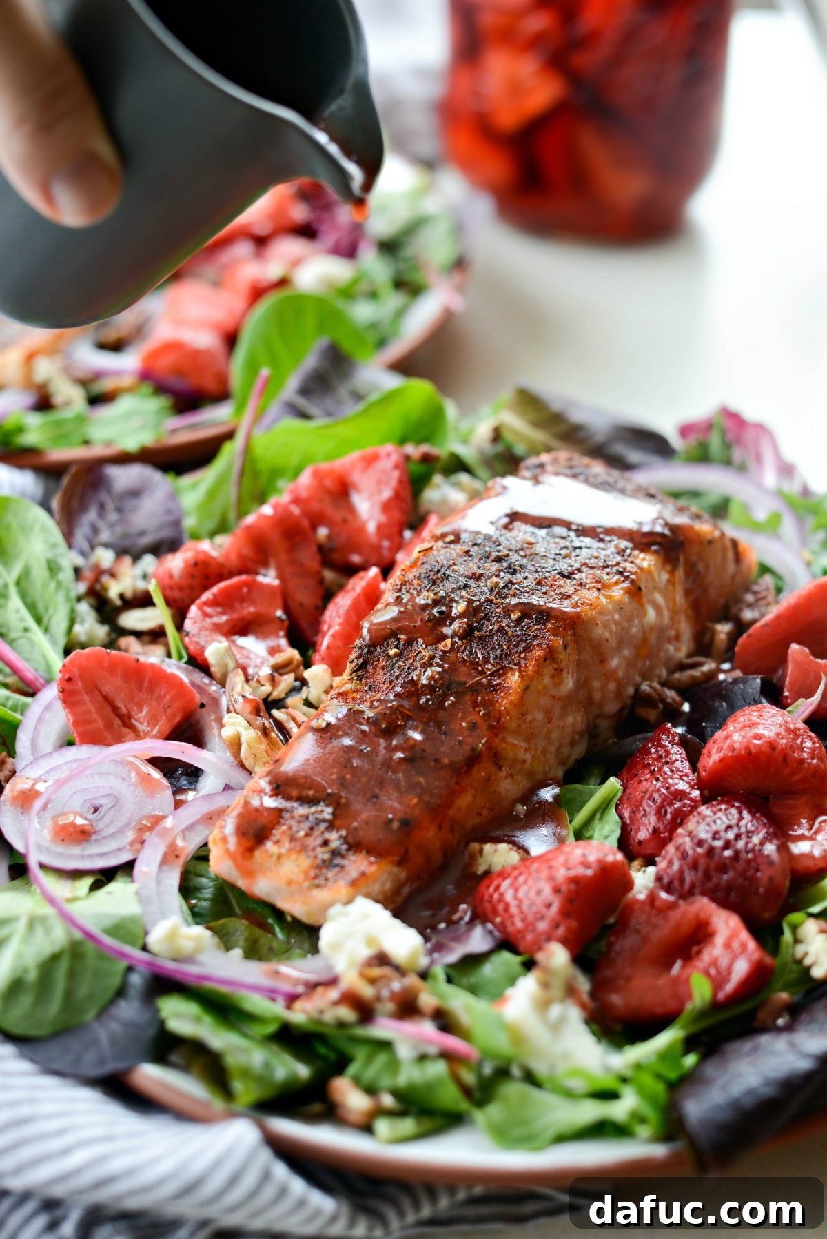 Another view of the Blackened Salmon Salad, highlighting the colorful combination of ingredients.