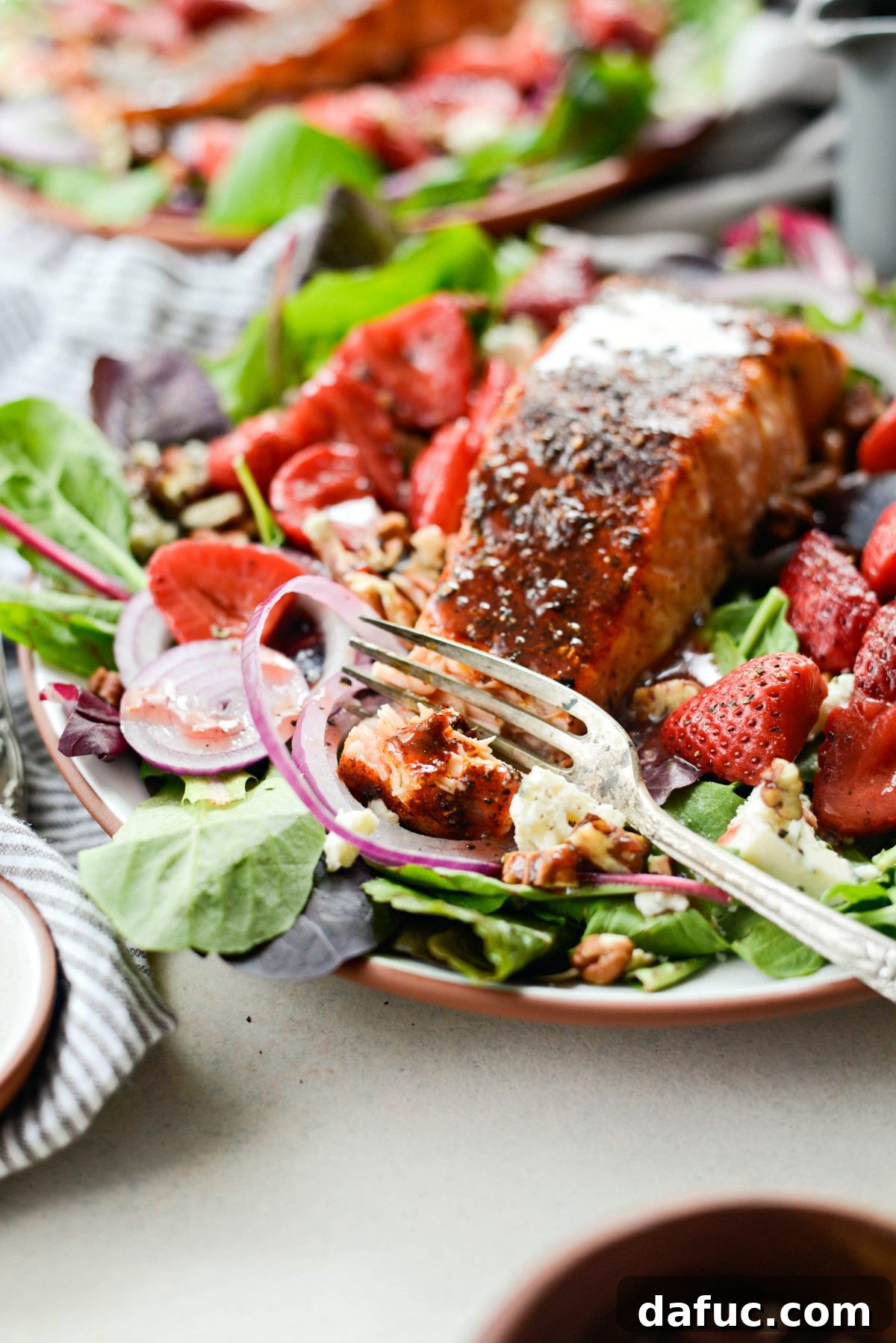 A final beautiful presentation of the Blackened Salmon Salad with Strawberry Peppercorn Vinaigrette.