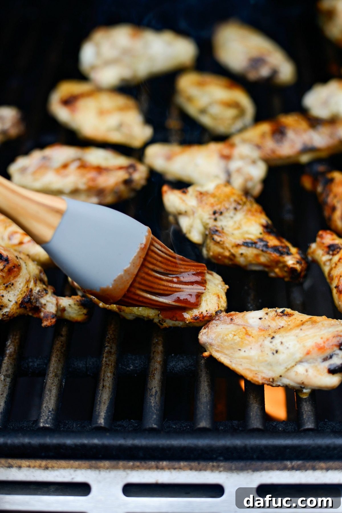 Sweet & Smoky Cherry Chipotle Wings 14 Basting grilled chicken wings with cherry chipotle barbecue sauce